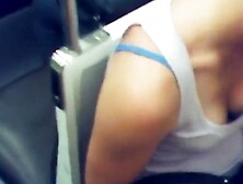 Great cleavage on a chick reading on the train