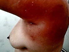 The wife soaping up her titties in the shower