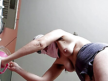 Sexy Latina nude in the kitchen. Sexy naked wife prepares food in the kitchen.