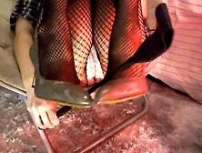 Oriental lady in fishnet stockings and heels ????