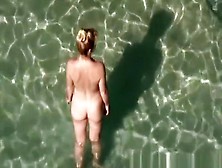 Nudist Woman Takes Off Her Black Bikini