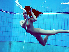 Alla Birtakik Undresses Nude In The Swimming Pool