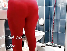 Moroccan Woman Cleaning Toilet