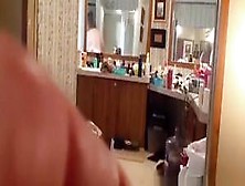 Fat mature woman doing her hygiene