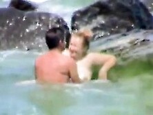 Couple Having Sex At The Sea