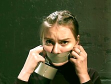 Chairtied In Catsuit & Boots