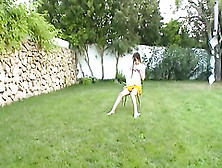 Ivana Teenie Getting Wet On The Grass