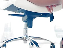 I'm in nylon tights and high heels sitting in an office chair