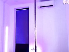 Cam Girl Stripping And Dancing Around Her Stripper Pole