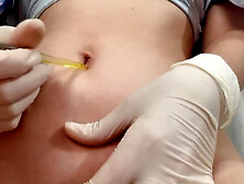 I play with my belly button using medical gloves