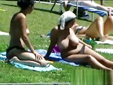 Busty Chick Tanning Outdoors Topless