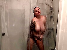 The Girl With Big Tits Takes A Shower And Masturbates