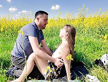 Romantic doggy le in a field