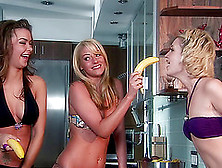 Kimberly,  Samantha And Sophia Play With A Banana In The Kitchen