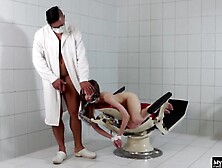 In this erotic fetish scene, Stella Cox finds herself bound to an exam chair.