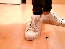 Stepping & Spitting In Well Worn White Adidas Trainers and Gold Boots
