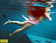 Simonna is hot and horny in the public swimming pool