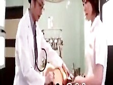 Japanese Doctor And Nurse Examine Patients Potency