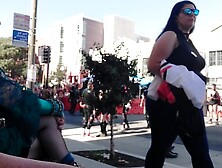 Public stroke with woman at Folsom Street Fair