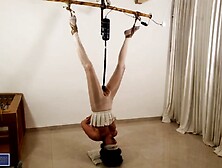 Slave In Upside Down Bondage Gets Fucked Deep With A Toy