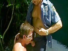 Two Lewd Cops Acquire A Guy On His Knees To Engulf 10-Pounder