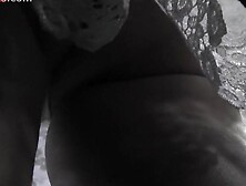 Auburn-haired gal shows off g-string in candid upskirts