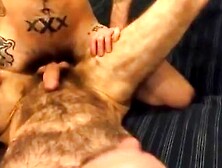 Tattooed Hunk Fucks A Hairy Man