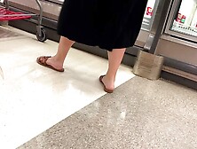 Spying Blonde Feet Walking In Store