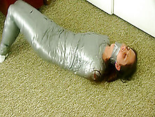 Cali Logan In Duct Tape Mummification With