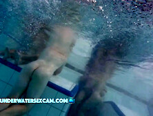 This Young Couple Plays Together Underwater In Front Of Many People