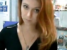 Pretty Redhead Fooling Around At Work