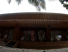 Naked on the veranda in the bungalow