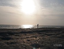 Cam Girl Relaxing On Beach