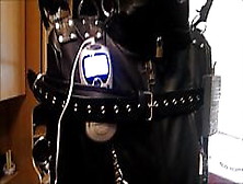 Estim In Leather Bondage