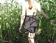 Kate Wood plays with her cunt inside a cornfield
