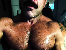 Muscle Daddy Blows Flexing And Using His Nipple Clmaps!