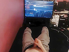 Girl Plays With Guy's Dick While He Enjoys Video Game.