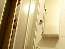 Teen Taking Shower In Bathroom