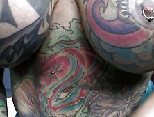 Heavily Tattooed And Pierced Biker Chick Black Widow Sucks