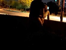 Sex in an intersection with cars driving by.