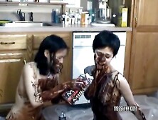 Playing With Chocolate Syrup,  These Two Foreign Whores Playfully Fondle Each Other