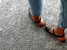 Beautiful Feet With Black Painted Toenails Of A Tall Antillean Girl (f