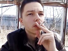 Guy In Black Leather Jacket Smoking