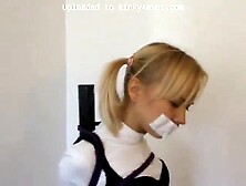 Foxy Bound To The Bondage Pole