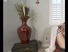 Solo blonde lady Natalia Queen in long stockings spreads her legs on a armchair in VR.