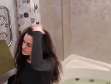 Brunette touching her titties and bald twat in the bathtub like she wants to masturbate