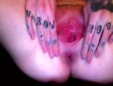 Closeup Of This Babe With Tats All Over Her Fingers Playing With Her Swollen Shaven Pussy.