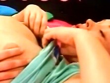 Lesbian Couples Share Intimate Moments in Bed