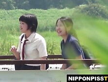 Pair Japanese women race who streams urine farthest out