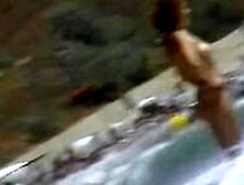 Real Beach Voyeur Video Of Hot Nudist Chicks Showing Off Their Bodies By The Water